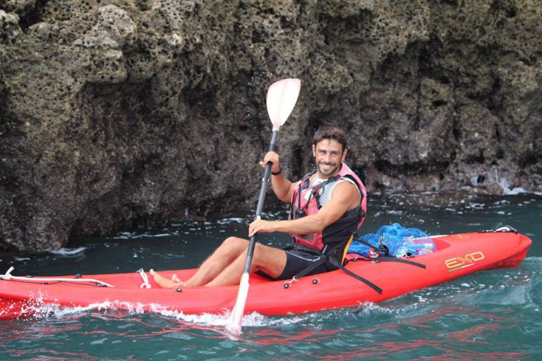 Ocean kayaking Sagres Fabio Mariano founder of South Kayaks paddling through grottos Portugal